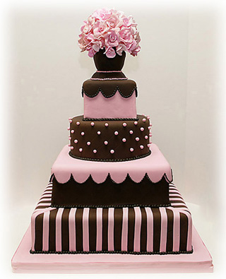 Black And White Wedding Cakes With Pink Flowers. Scroll Work and Flowers